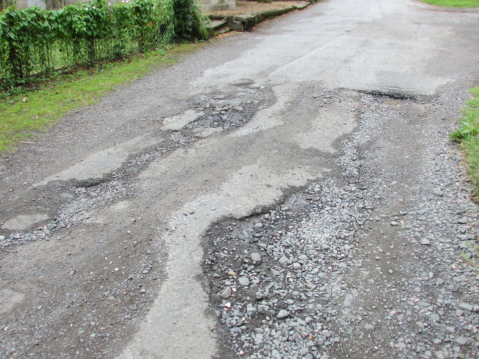 What to do if you damage your leased van on a pothole? 